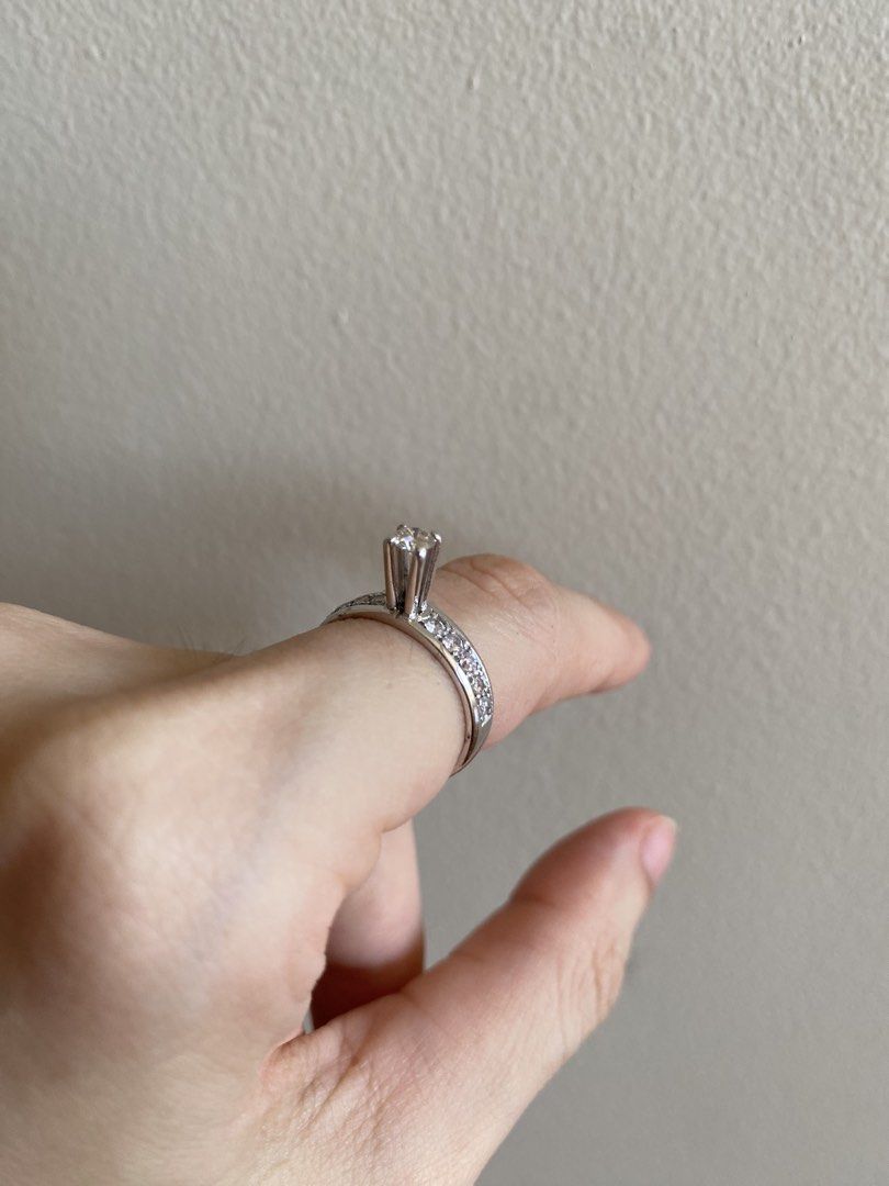 14K Diamond Ring (around 7.8K/g) 5 white gold can be engagement ring (Category: Rings) located in Cebu City. Submitted by mystuffathome (Listing ID 1446027937, Image 2). Description: - 14 kt, 2.8g All natural diamond - Center diamond .16 ct with 10 Ji other diamonds .30ct, total of 0.46 ct - size 5 - has scratches - RFS: not really using it anymore.
