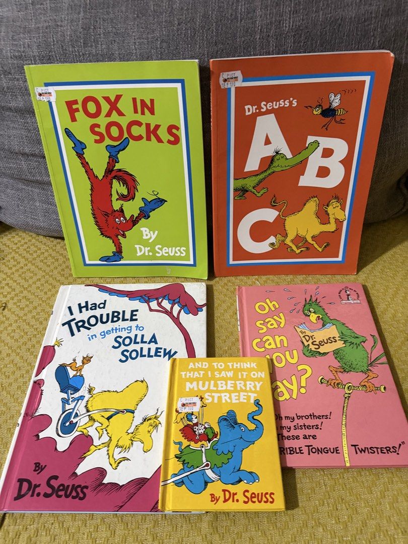 Dr. Seuss Beginner Books Collection - 5 Books (Category: Children's Books) located in Muntinlupa City. Submitted by patliza (Listing ID 1446137784, Image 1). Description: Selling a bundle of 5 Dr. Seuss books. Includes 'Fox in Socks', 'Dr. Seuss' ABC', 'I Had Trouble in Getting to Solla Sollew', and 'Oh, Say Can You Say?'. Great for young readers and collectors. Some wear and tear visible on 'Oh, Say Can You Say?' and 'I Had Trouble in Getting to
