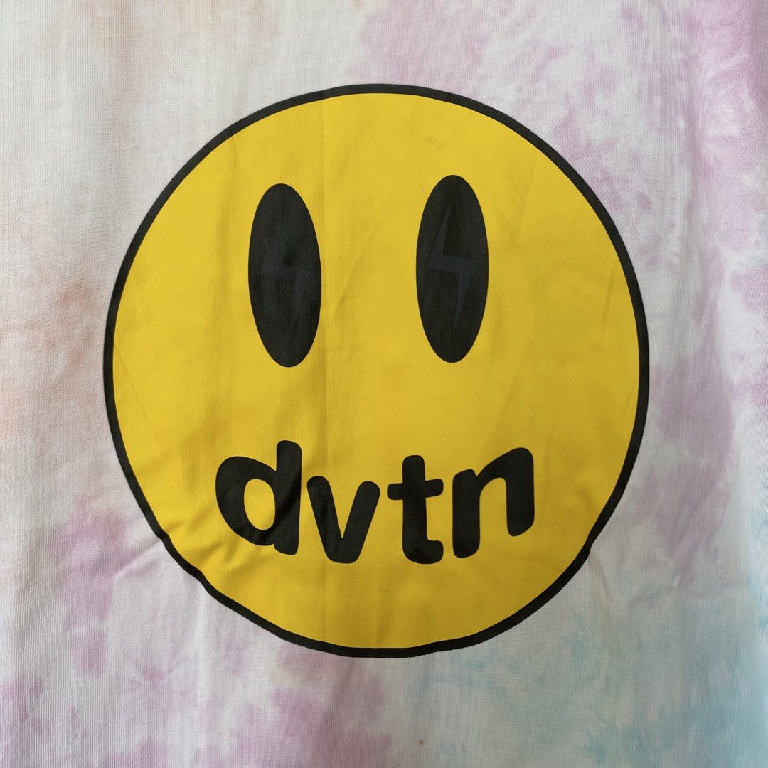 DVTN Smiley Tie-Dye T-Shirt (Category: Tshirts & Polo Shirts ) located in Cavite. Submitted by branchee_chic (Listing ID 1446065668, Image 3). Description: 💕L-XL 💕Need wash 💕This is UKAY! Please Manage your expectations. Thank you!:) - DVTN Tie-Dye T-Shirt - Unique pastel pink, purple, and blue tie-dye pattern - Features a cheerful yellow smiley face graphic - Made from 100% comfortable cotton - Perfect for stylish, casual everyday wear.