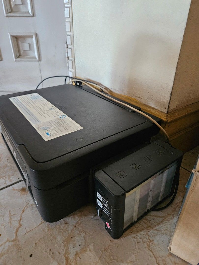 Epson L210 (Defective/Broken) (Category: Printers, Scanners & Copiers) located in Calasiao. Submitted by carlpua03 (Listing ID 1445994282, Image 1). Description: Selling Defective Epson L210 Printer Defect: Can not print, but can still scan (Shipping Fee to be shouldered by buyer).