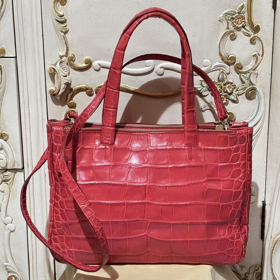 FURLA CROC EMBOSSED TOP HANDLE BAG VINTAGE AUTHENTIC (Category: Luxury Bags & Wallets) located in Bulacan. Submitted by herbertvintageshop (Listing ID 1446128876, Image 2). Description: Authentic furla croc embossed top handle bag / red top handle bag Gold tone non tarnis / great condition Shoulder long handle drop 55cm Handle drop 19cm Width 33cm Height 25cm Depth 12cm Made in tunisia hard to come by / from japan See pic to appreciate Courier fl