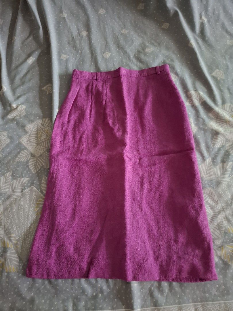 Fuschia straight linen midi skirt (Category: Skirts) located in Pasig City. Submitted by keekeedee (Listing ID 1446022814, Image 2). Description: pencil skirt Below the knee back button and zipper with belt loops Fully lined with overlap back slit Length: 25” waistline: 27" 100% linen Imported.