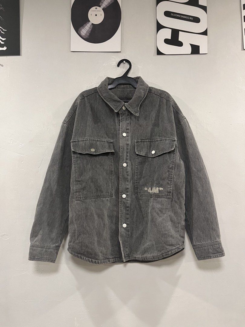 Grey Denim Jacket "4AM" Graphic Print (Category: Coats, Jackets and Outerwear) located in Paranaque City. Submitted by mrthingsman (Listing ID 1446134322, Image 1). Description: - Grey washed denim jacket - Graphic '4AM' print on the back - Two chest pockets with button closure - Button-up front - Relaxed fit - Ideal for layering.