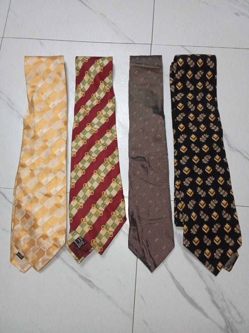 Prada,Valentino,Silk Ties Set All Authentic (Category: Ties) located in Manila. Submitted by christoph17 (Listing ID 1446132810, Image 1). Description: - 1 Valentino tie -1 Prada - All ties made in Italy - Ideal for dressing up any outfit -500 each Gucci Sold.