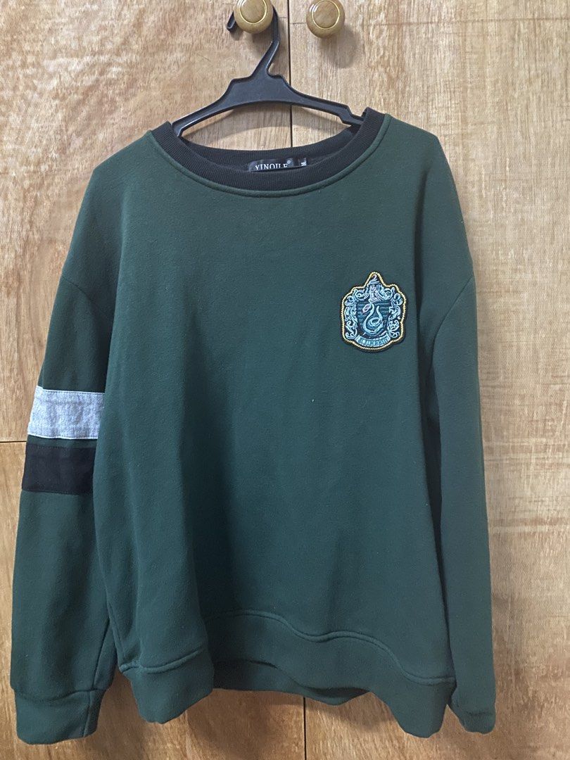 Harry Potter Slytherin Crest Sweatshirt (Category: Coats, Jackets and Outerwear) located in Manila. Submitted by dom2005 (Listing ID 1446102611, Image 1). Description: - Harry Potter sweatshirt with Slytherin crest.