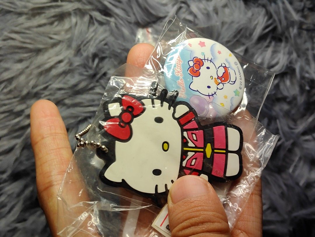 Hello Kitty Keychain, PIN and tissue holder (Category: Character Goods) located in Pasig City. Submitted by hazelscollectibles (Listing ID 1446047072, Image 3). Description: - Adorable Kitty set perfect for collectors and fans. tissue holder 85 gundam x hello kitty keychain 180 pin 65 pink keychain 130 figure 175 - Includes a stylish fabric notebook with a blue and white Kitty design. - Features a unique Gundam x Kitty keychain. - Comes with a cu