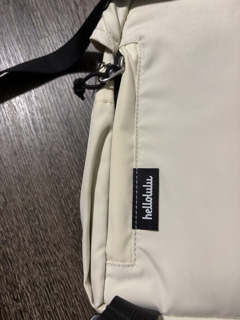 hellolulu Cream Drawstring Backpack (Category: Backpacks) located in Singapore. Submitted by newcat714 (Listing ID 1446033887, Image 3). Description: - Brand: hellolulu - Color: Cream - Closure: Drawstring top - Exterior: Side pockets - Interior: Multiple compartments - Size: Approx. 30cm (H) x 25cm (W) - Ideal for: Daily essentials.