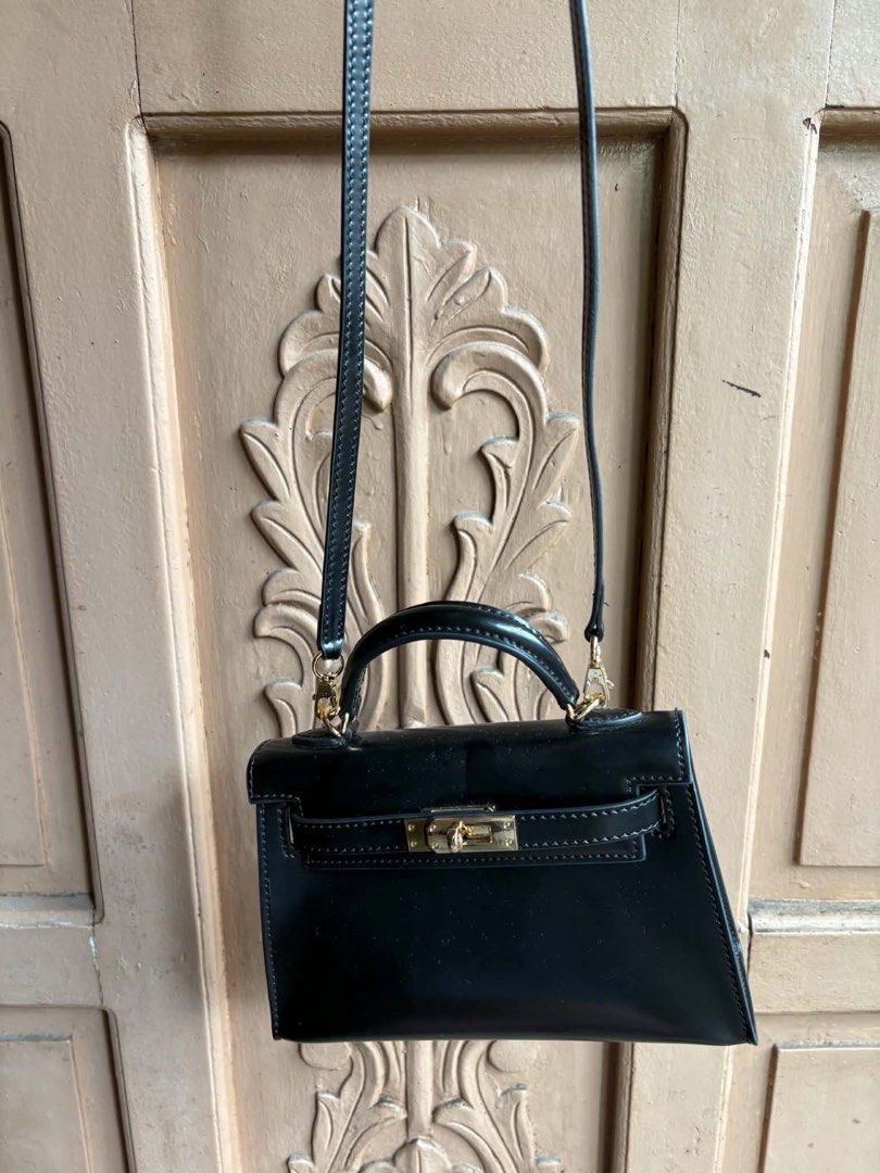Hermes Kelly Mini Black Leather Gold Hardware (Category: Luxury Bags & Wallets) located in Manila. Submitted by graciouslygraceee (Listing ID 1445995974, Image 3). Description: - Classic black mini Kelly bag - Made in France - Elegant gold hardware details - Includes both top handle and shoulder strap - Perfect for dressing up or down - A timeless addition to your collection - Please check photos for detailed condition.