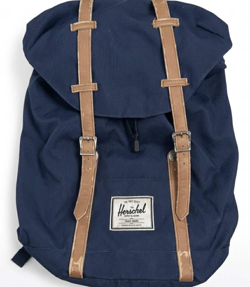 Herschel navy blue backpack bag (Category: Laptop Bags & Sleeves) located in Dagupan City. Submitted by chichi_declutter (Listing ID 1445984798, Image 1). Description: .