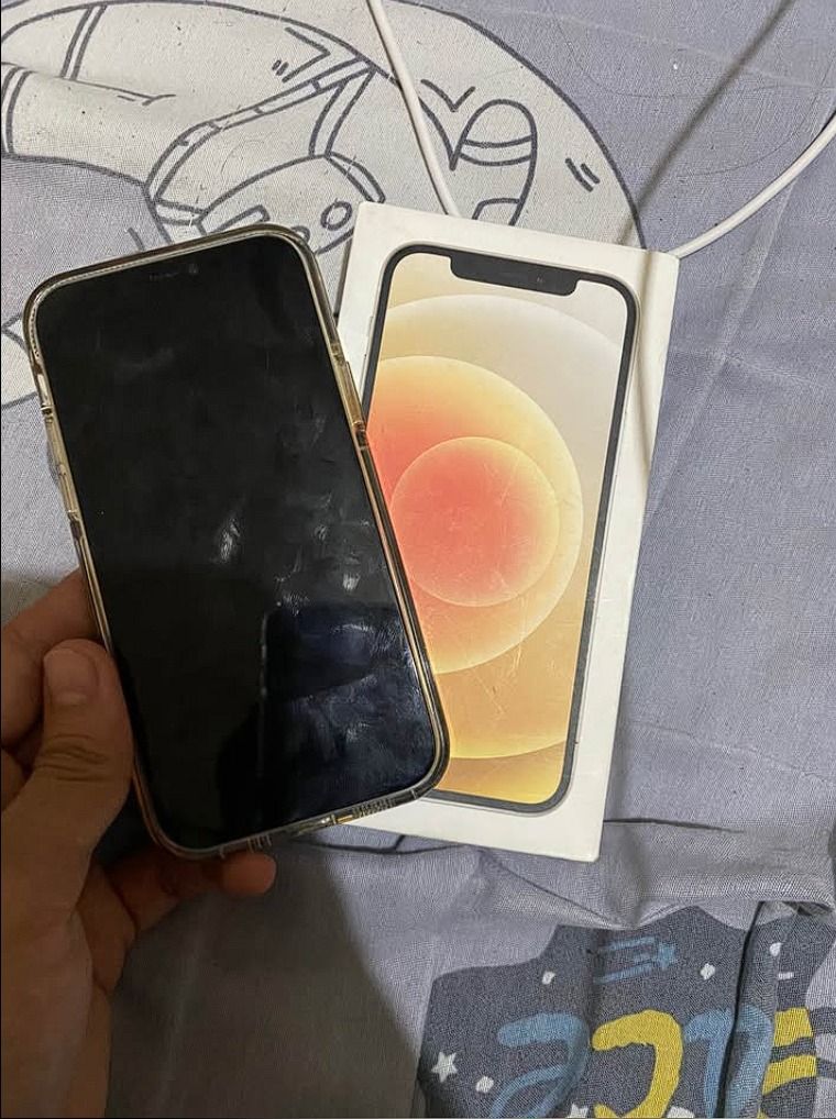 iPhone 12 64GB (Category: iPhone 12 Series) located in Makati City. Submitted by tjmdn (Listing ID 1446135495, Image 2). Description: 📱 FOR SALE / FOR SWAP: iPhone 12 64GB 💰 Price: ₱10,500 (Negotiable for sure buyers) 🔄 Open for Swap – Higher unit only (I can add cash depending on the offer) 📱 Unit Details ✅ iPhone 12 64GB ✅ 93% Battery Health 🔋 ✅ Fully Functional ✅ Smooth and fast performance ✅ All buttons working properly ✅ Loud speakers &