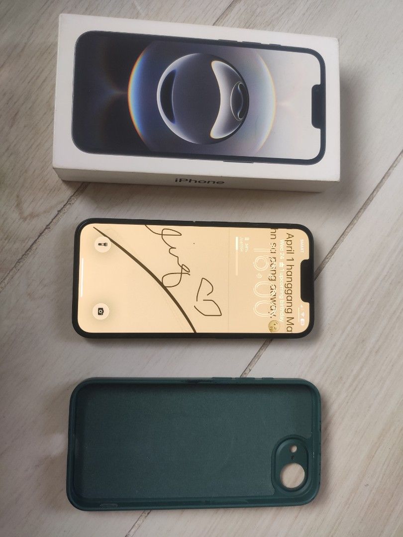 iPhone 16e 128GB (Category: iPhone 16 Series) located in General Mariano Alvarez. Submitted by lucian91 (Listing ID 1446071661, Image 2). Description: - iPhone 16e - 128GB Storage - Color: Black - Includes original box - Comes with a dark green protective case - Perfect for daily use, gaming, and photography -Have Tempered Glass and Minor Cracks and Scratches did not afftect the performance.