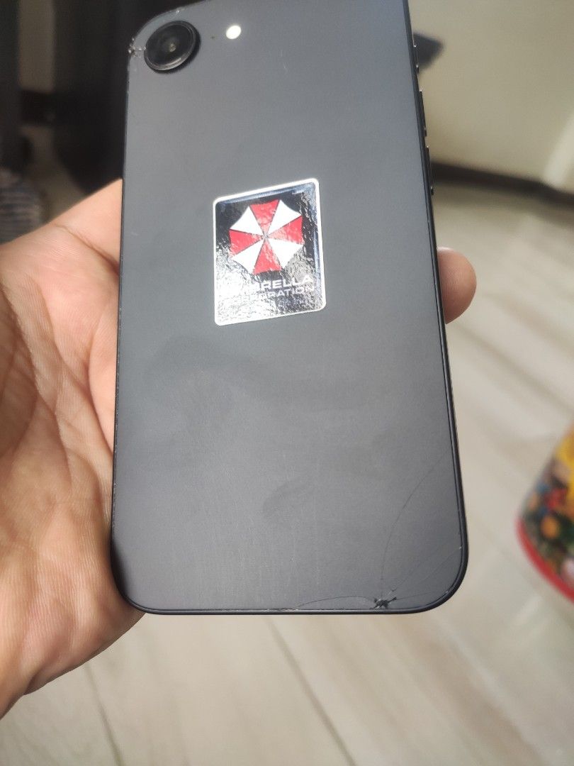 iPhone 16e 128GB (Category: iPhone 16 Series) located in General Mariano Alvarez. Submitted by lucian91 (Listing ID 1446071661, Image 3). Description: - iPhone 16e - 128GB Storage - Color: Black - Includes original box - Comes with a dark green protective case - Perfect for daily use, gaming, and photography -Have Tempered Glass and Minor Cracks and Scratches did not afftect the performance.