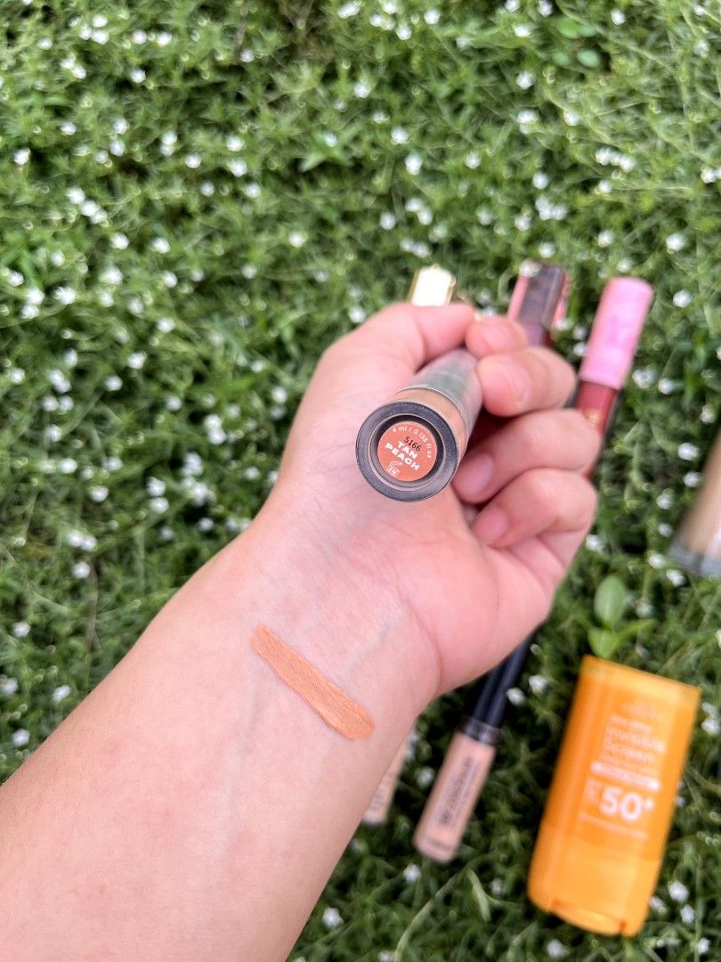 Issy Under-Eye Brightening - Tan Peach (Category: Makeup) located in Lingayen. Submitted by kat_declutter (Listing ID 1446125351, Image 2). Description: - Issy Under-Eye Brightening Fluid -Only used thrice (i have strokes peach corrector) - Shade: Tan Peach - Ideal for: Tan to tan-deep skin tones - Benefits: Brightens under-eye area, conceals dark circles, provides a refreshed look - Condition: Swatched on arm to show shade - Features: Comes with