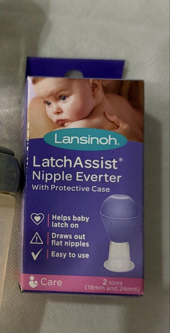 Lansinoh Latch Assist Nipple Everter with Protective Case (Category: Breastfeeding & Bottle Feeding) located in Makati City. Submitted by eyes_jade (Listing ID 1446158476, Image 2). Description: - Helps baby latch on effectively. - Designed to draw out flat nipples. - Simple and easy to use for moms. - Comes with a protective case for hygiene and portability. - Includes two common sizes: 19mm and 24mm. - An essential tool for breastfeeding mother