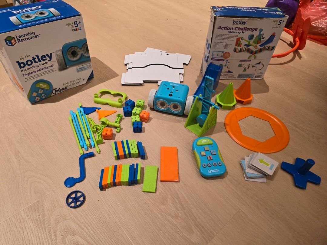 Learning Resources Botley Coding Robot & Accessory Set (Category: Educational & Learning Toys) located in Singapore. Submitted by luvinjw (Listing ID 1446150366, Image 1). Description: - Botley Coding Robot - Action Challenge Accessory Set - Includes robot, remote, and various accessories - Fun building and coding challenges - Ideal for kids learning STEM - Original boxes included.