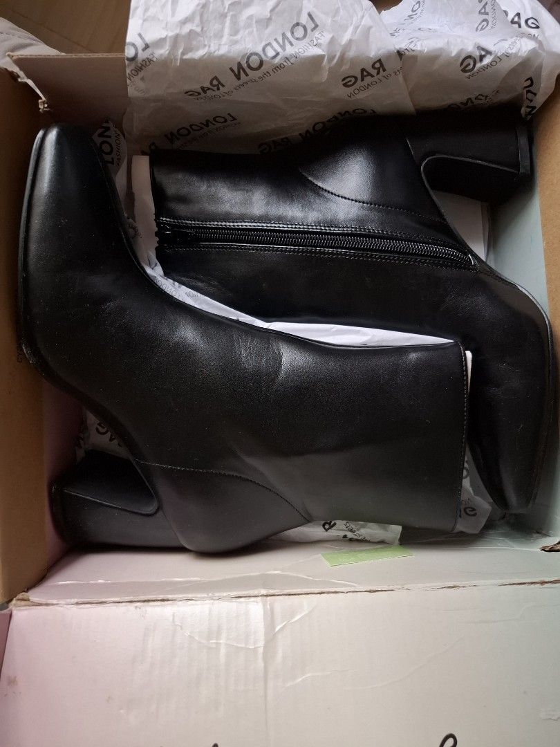 London Rag Boots (Category: Boots) located in San Fernando. Submitted by raiaea (Listing ID 1446061541, Image 3). Description: - Type: Boots - Upper Material: Faux Leather - Outer Sole: TPR - Closed Square Toe - Side Zipper Closure - Triangular Block Heels - Heel Height: 3 inches Size: US 7 | EU 38 | 24.5 cm Used once with socks and rumampa lang sa bahay. Not yet used outside. Check photos for flaw. The whites on the picture can still be cleaned 