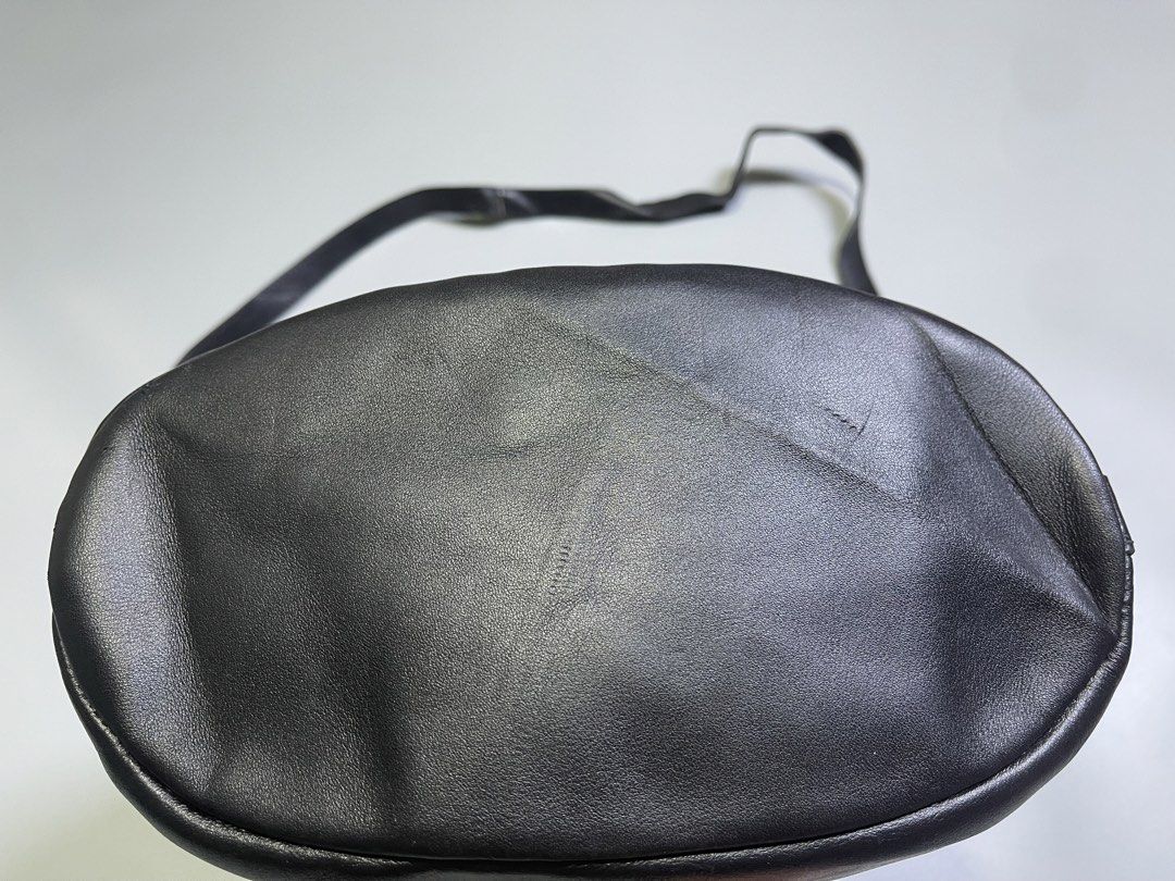 Longchamp Paris Black Leather Drawstring Bucket Bag (Category: Luxury Bags & Wallets) located in Zamboanga. Submitted by laffthrift_23 (Listing ID 1446141978, Image 3). Description: - Authentic Longchamp Paris black leather bucket bag - Secure drawstring closure - Adjustable shoulder strap for comfort - Classic and versatile for everyday wear.