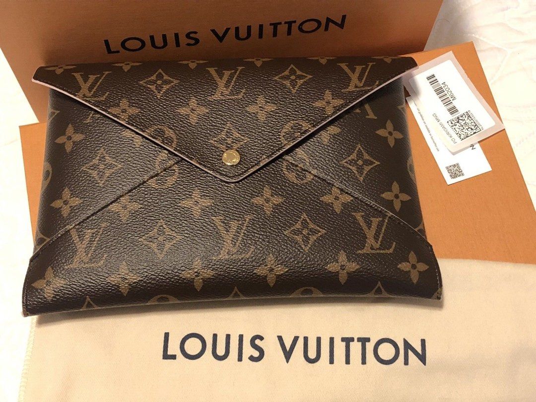Louis Vuitton Kirigami Monogram Large Pouch (Category: Luxury Bags & Wallets) located in Muntinlupa City. Submitted by shopaholicstill (Listing ID 1446078619, Image 1). Description: Louis Vuitton Kirigami Monogram Large Pouch - Stylish envelope design - Secure snap button closure - Includes original box, dust bag, and tag - Ideal for organizing essentials or as a chic clutch 27K with copy of receipt from LV solaire (personally bought, not a resel