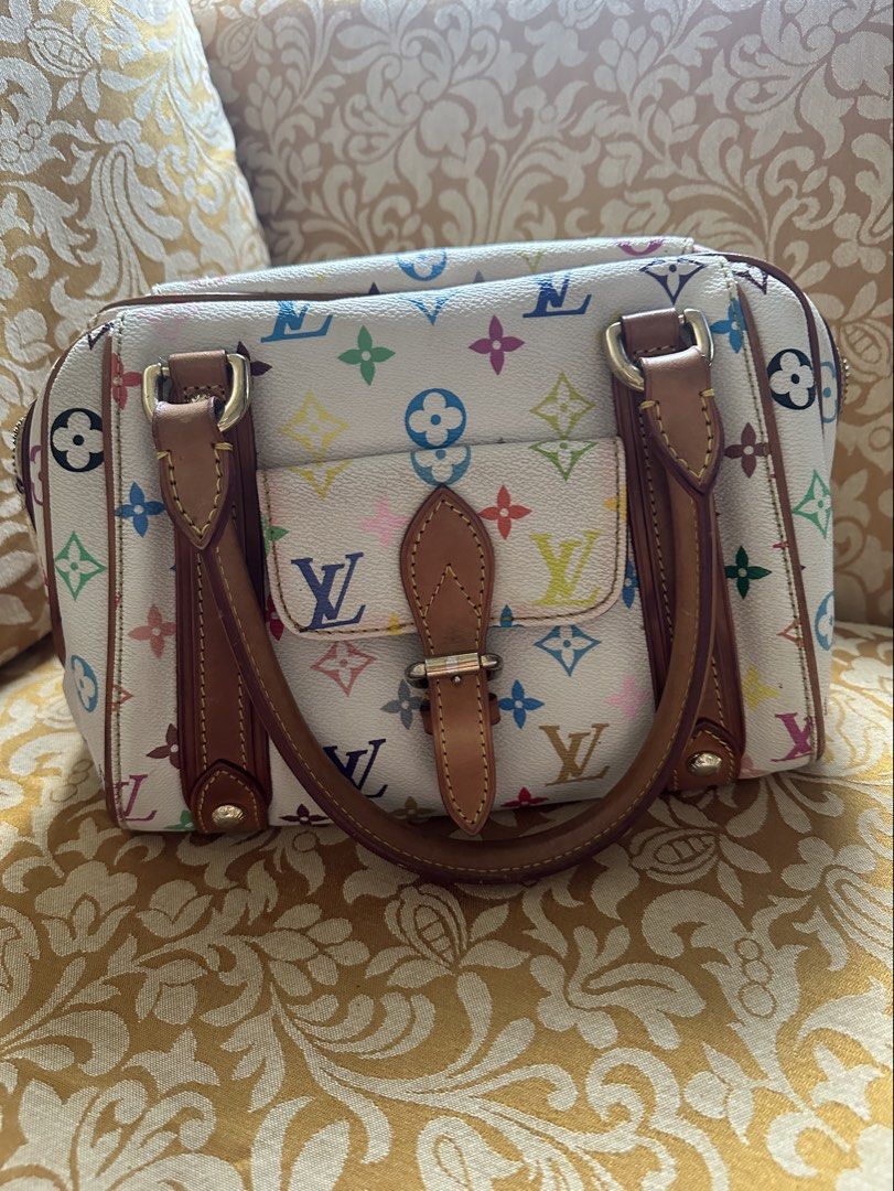Louis Vuitton Monogram Multicolore Speedy 30 (Category: Luxury Bags & Wallets) located in Taguig. Submitted by ireneria1984 (Listing ID 1445987356, Image 1). Description: - Authentic Louis Vuitton Speedy 30 - Monogram Multicolore canvas (white with colorful LV logos & flowers) - Genuine leather trim and handles - Secure zipper closure - Interior pockets for organization - Made in France - Iconic and collectible LV piece.