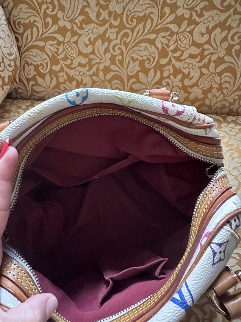 Louis Vuitton Monogram Multicolore Speedy 30 (Category: Luxury Bags & Wallets) located in Taguig. Submitted by ireneria1984 (Listing ID 1445987356, Image 3). Description: - Authentic Louis Vuitton Speedy 30 - Monogram Multicolore canvas (white with colorful LV logos & flowers) - Genuine leather trim and handles - Secure zipper closure - Interior pockets for organization - Made in France - Iconic and collectible LV piece.