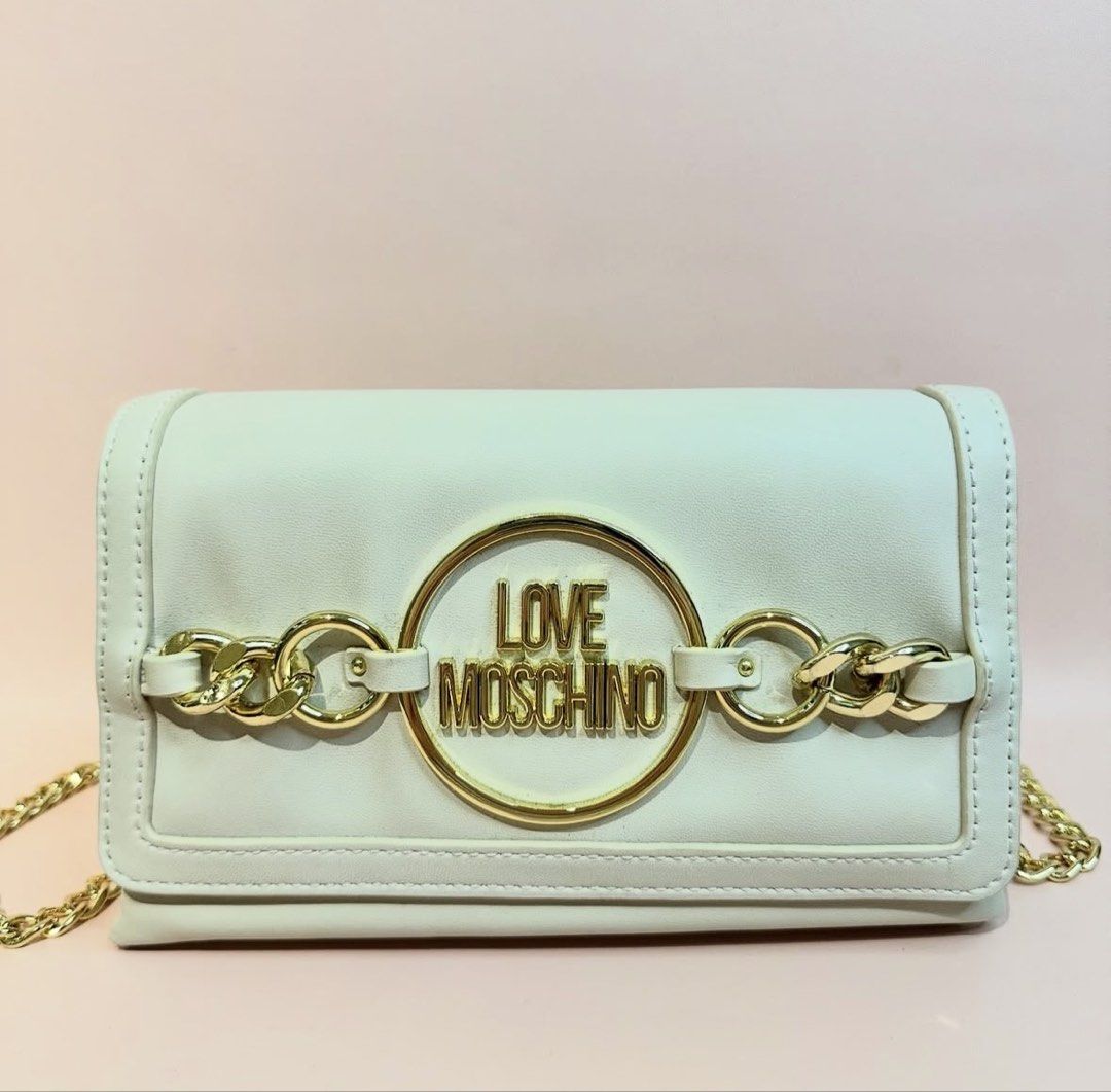 Love Moschino Crossbody Bag (Category: Cross-body Bags) located in San Fernando. Submitted by patmalonzo (Listing ID 1446029044, Image 1). Description: Good as new Used once only.