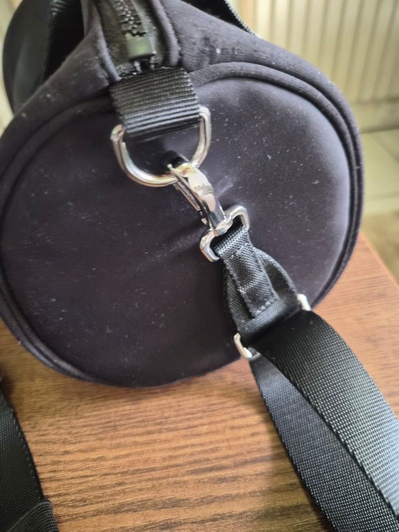 Lululemon Knit Nylon Mini Barrel Duffle Bag 5L (Category: Luxury Bags & Wallets) located in Manila. Submitted by fasyon (Listing ID 1446011860, Image 3). Description: Authentic Lululemon bag. Purchased in Chicago June 2025. In excellent overall condition with signs of wear from normal use. Some light lint/fuzz and minor fabric marks due to use and storage (please refer to photos). No tears, holes, or major flaws. With Lululemon shopping bag..