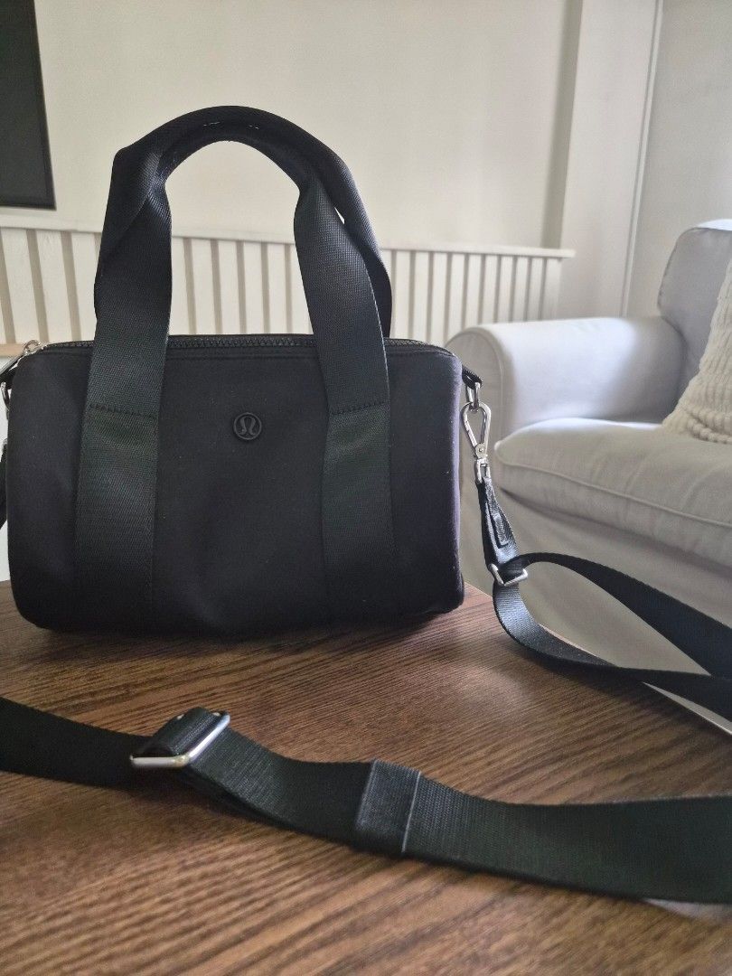 Lululemon Knit Nylon Mini Barrel Duffle Bag 5L (Category: Luxury Bags & Wallets) located in Manila. Submitted by fasyon (Listing ID 1446011860, Image 1). Description: Authentic Lululemon bag. Purchased in Chicago June 2025. In excellent overall condition with signs of wear from normal use. Some light lint/fuzz and minor fabric marks due to use and storage (please refer to photos). No tears, holes, or major flaws. With Lululemon shopping bag..