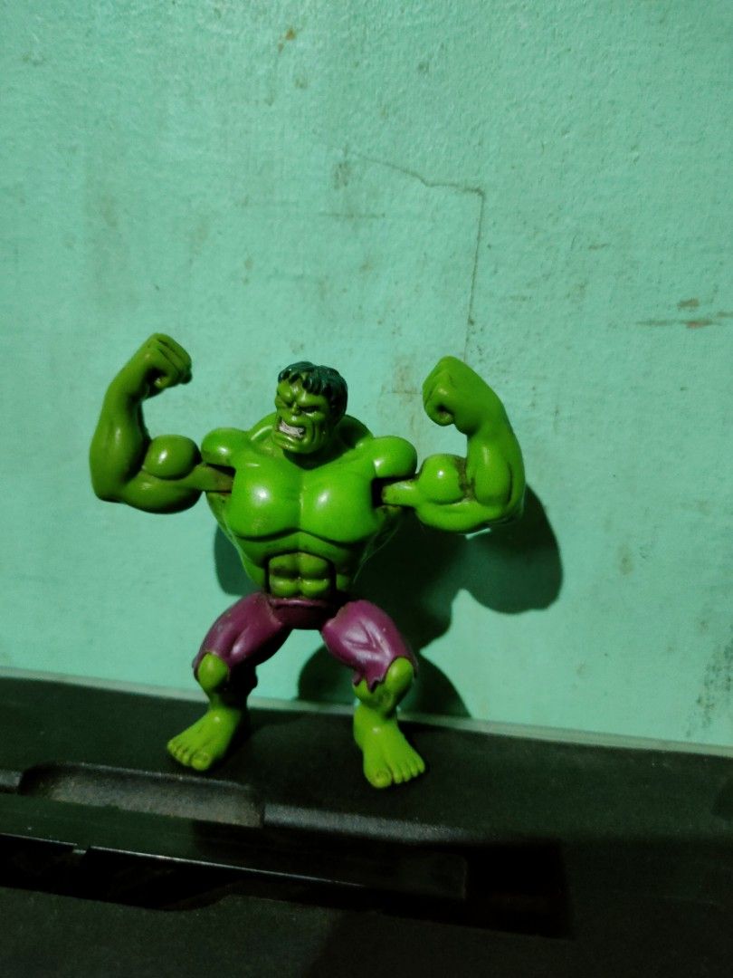 Marvel The Incredible Hulk Action Figure Toy (Category: Figurines & Statues) located in Pasig City. Submitted by laruannijearly (Listing ID 1446101908, Image 1). Description: - Green Hulk figure - Wears purple pants - Posing with flexed arms - Ideal for Marvel fan collections - Stands on its own - Fun for display or play.