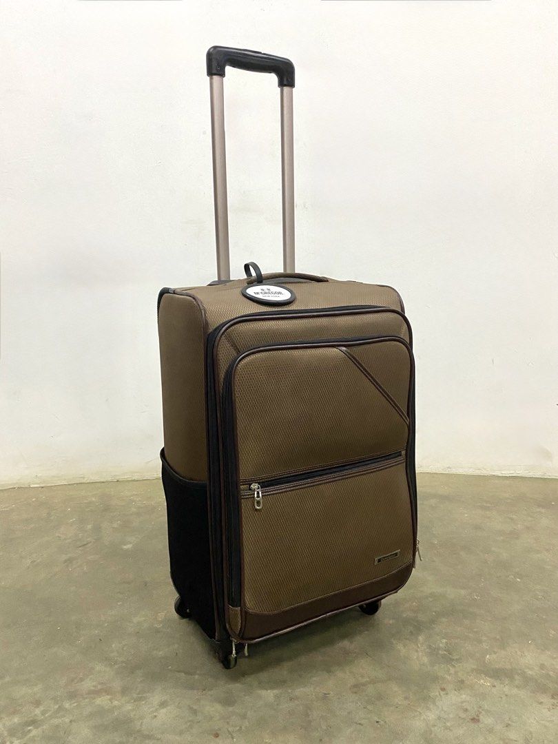 McGregor New York Brown Rolling Suitcase Luggage (Category: Luggage) located in Santa Rosa. Submitted by annie_annie83 (Listing ID 1446146711, Image 1). Description: - Brand: Brown McGregor New York - Type: Rolling Suitcase - Dimensions: Approximately 20 inches tall - Features: Retractable handle, wheels for easy transport, front zippered pocket, side pocket - Ideal for: Travel.
