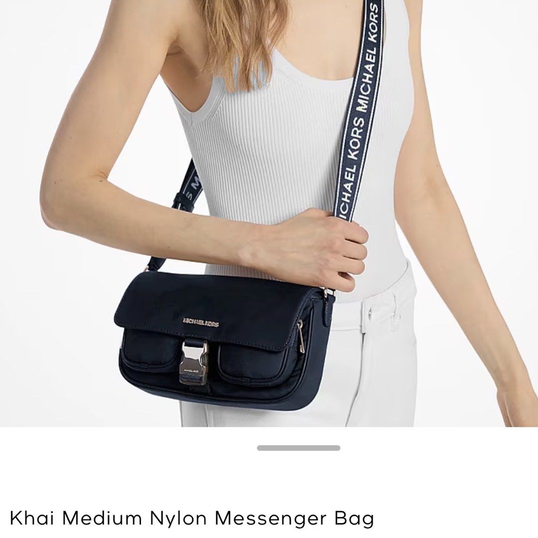 Michael Kors Khai Medium Nylon Messenger Bag Black (Category: Luxury Bags & Wallets) located in Manila. Submitted by paaaaat_2021 (Listing ID 1446052723, Image 2). Description: Michael Kors Khai Nylon Messenger Bag - original, black - like new, used twice - with care card and tag, no paper bag RFS: declutter P3,800 + SF (slightly negotiable).