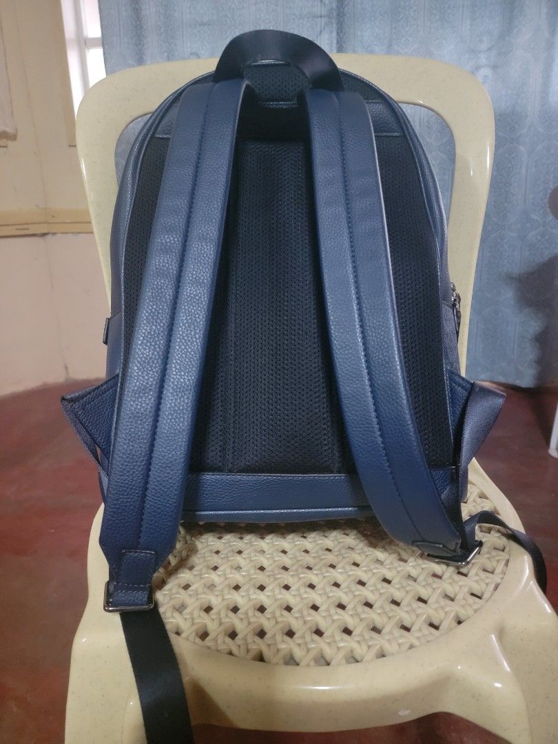 Michael Kors MK (Category: Luxury Bags & Wallets) located in Aguinaldo. Submitted by rhoullcla063142 (Listing ID 1446037580, Image 2). Description: ✅ Type: Premium Casual / Office / Travel Backpack ✅ Color: Navy Blue / Denim Blue with White & Light Blue Accents ✅ Material: High-quality coated canvas with MK monogram print + smooth synthetic leather trims ✅ Style: Modern striped design, silver-tone metal MK logo hardware.