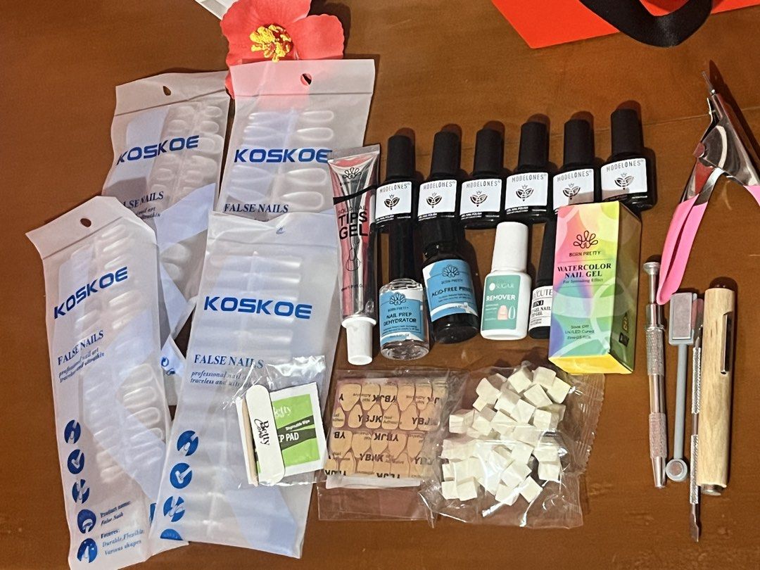 Nail kit set for beginners (Category: Hands & Nails) located in Vigan. Submitted by yuk1noo (Listing ID 1446113576, Image 3). Description: 🛒 Nail kit set for beginners — 58 macaron colors gel nail polish — 6 Modelones Nude moonlight cat eye — Kousia (glass, matte, super base coat) — Soft Gel tips ( Born pretty, Koskoe, Ur sugar) — Uv lamp — and other items in the photo RFS: Hindi ko nagagamit, used twice lang. New hobby sana pero tinatamad ako a