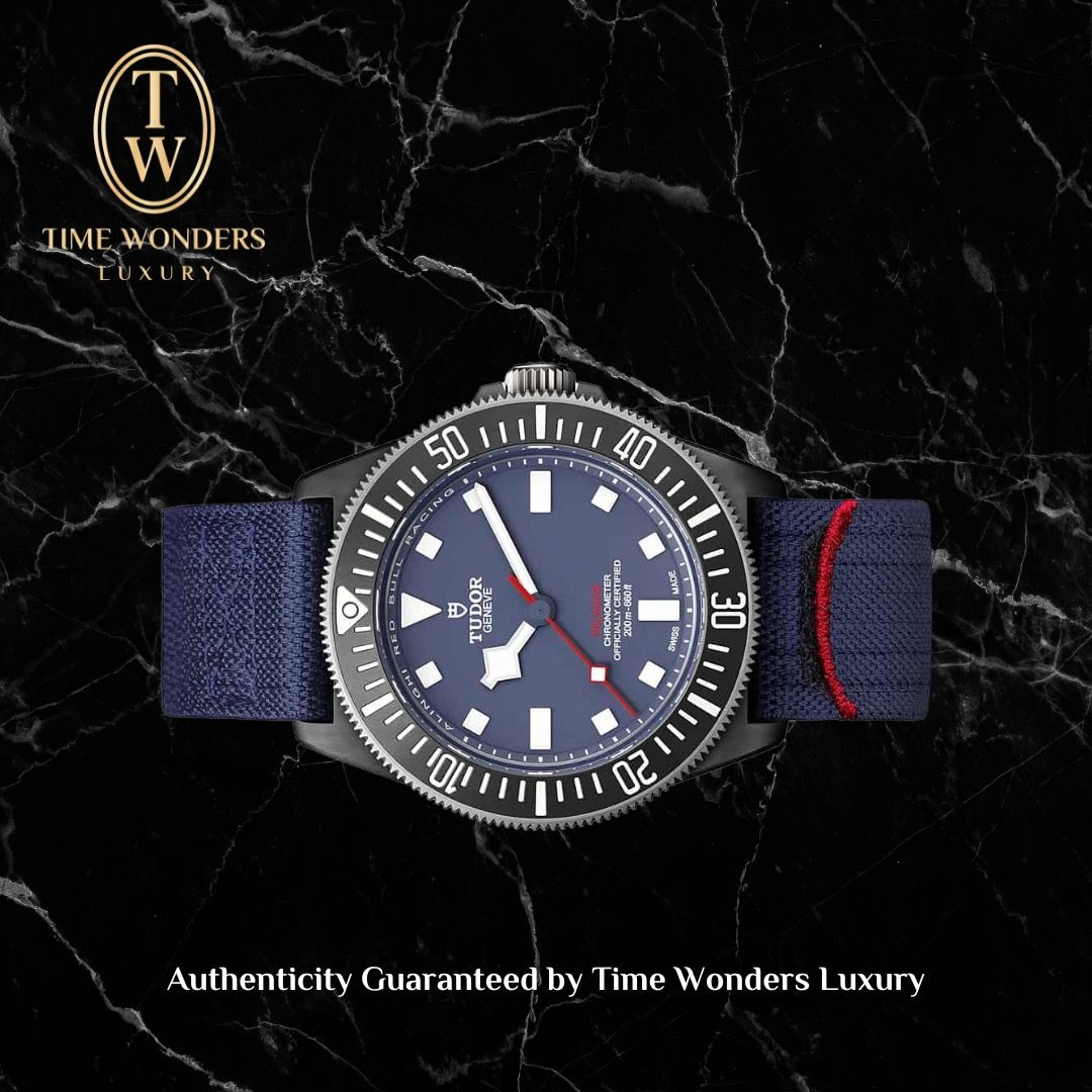New January 2026 Tudor Pelagos FXD Blue Alinghi Red Bull 42mm 25707KN Black Carbon 25707 (Category: Watches) located in Singapore. Submitted by timewondersluxury (Listing ID 1446088770, Image 1). Description: Brand: Tudor Model: 25707KN Condition: New Dial: Blue Case Diameter: 42mm Movement : Automatic Material: Black Carbon Bracelet: Fabric Strap Original Box: Yes Original Cert/Papers: Yes Dated: January 2026 Warranty: AGENT INTERNATIONAL WARRAN