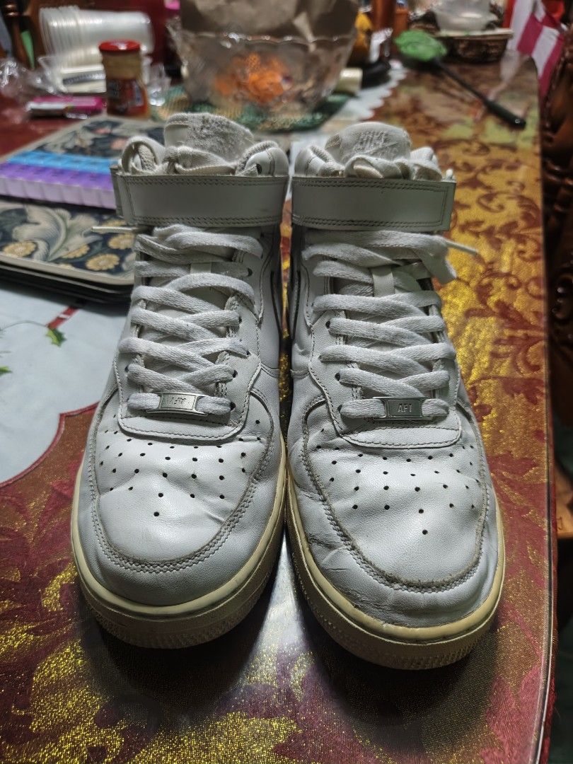 Nike Air Force 1 Mid White Sneakers (Category: Sneakers) located in Bacoor. Submitted by davealvare39194 (Listing ID 1446029167, Image 2). Description: Af1 mid '07 Size 44 Issue: yellowish sa sole 550.