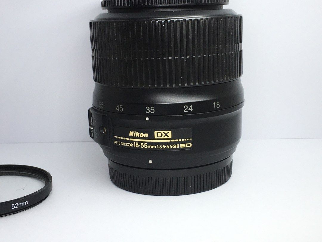 Nikon 18-55 DX lens (Category: Lens & Kits) located in Las Pinas. Submitted by film101 (Listing ID 1446107494, Image 2). Description: Nikon DX AFS nikkor 18-55 f3.5-5.6 GII ED BOUGHT IN HK‼️‼️ Its 2006 ver lens in good working condition Optics good No fungus Smooth focusing Inclusion filter ring and rear cap (generic)only .