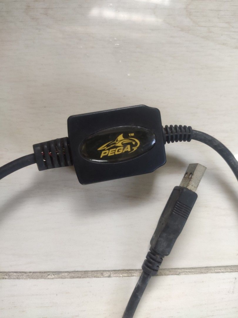 Pega USB Controller Adapter for PS2/PS1 (Category: Controllers) located in General Mariano Alvarez. Submitted by lucian91 (Listing ID 1446072243, Image 1). Description: - Pega brand USB adapter - Connects PS1/PS2 controllers to your PC via USB - Perfect for PC gaming - Tested and confirmed working - Color: Black.