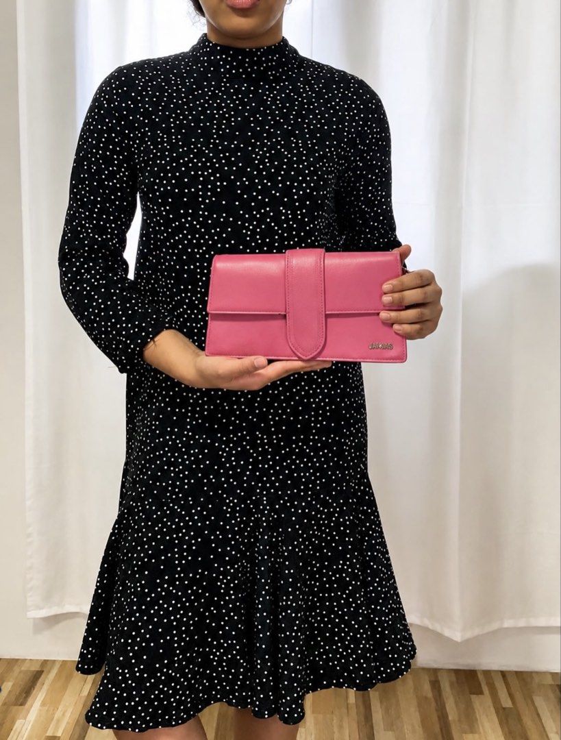 Pink Leather Clutch Bag (Category: Luxury Bags & Wallets) located in Quezon City. Submitted by rebagged.mnl (Listing ID 1446015507, Image 1). Description: - Features a stylish buckle closure on the front - Simple yet chic design, ideal for evening wear - Adds a vibrant pop of color to any outfit - Spacious enough for essentials: phone, cards, lipstick - Interior is clean and well-maintained.