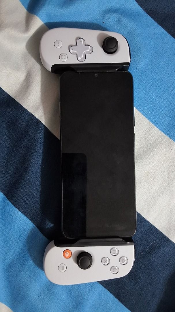 PlayStation Backbone One (2nd Gen) USB Type C with Carrying Case (Category: Controllers) located in Paombong. Submitted by lodsqt (Listing ID 1446045775, Image 2). Description: - Controller for mobile phones by PlayStation - Phones with different type of port might be able to use this because there's a port on the right handle (type c). - There's also a 3.5mm jack for connecting headphones - Includes the carrying case RFS: I'm not really a mobile