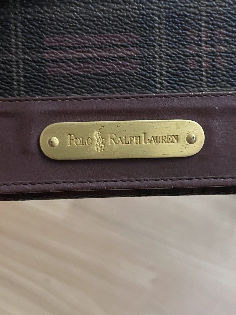 Polo Ralph Lauren Plaid Long Wallet (Category: Wallets & Card holders) located in Victorias. Submitted by lan1877 (Listing ID 1446099832, Image 3). Description: - Polo Ralph Lauren long wallet - Classic plaid pattern with leather trim - Multiple card slots - Clear ID window - Gold-tone hardware with Polo Ralph Lauren logo plate - Stylish and practical for everyday use.