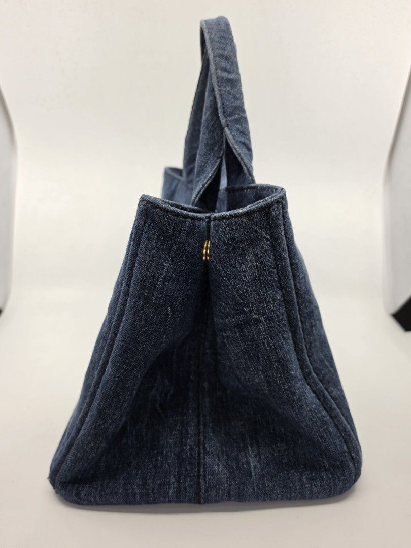 PRADA CANAPA DENIM (Category: Luxury Bags & Wallets) located in Quezon City. Submitted by nadine_miel (Listing ID 1446029672, Image 3). Description: Prada Canapa denim medium size w/ adjustble long strap in excellent condition send us pm for detailed photo for only 28k.
