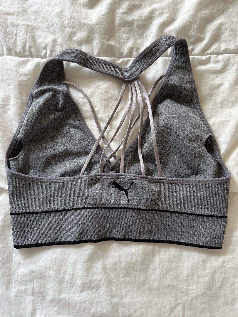 Puma Grey Sports Bra Strappy Back (Category: Activewear) located in Manila. Submitted by rhaphina (Listing ID 1446043312, Image 2). Description: - Grey Puma sports bra - Stylish strappy back design - Comfortable seamless knit construction - Elasticated waistband with prominent Puma logo - Ideal for workouts and everyday comfort.