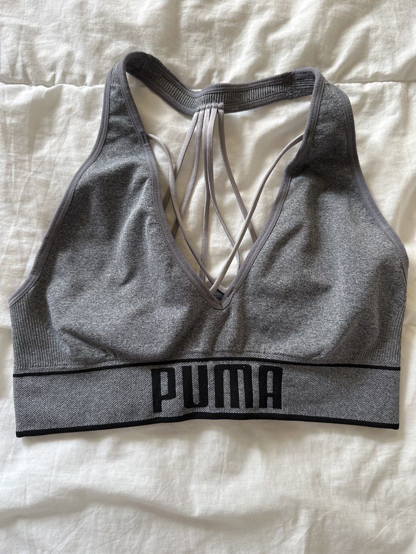 Puma Grey Sports Bra Strappy Back (Category: Activewear) located in Manila. Submitted by rhaphina (Listing ID 1446043312, Image 1). Description: - Grey Puma sports bra - Stylish strappy back design - Comfortable seamless knit construction - Elasticated waistband with prominent Puma logo - Ideal for workouts and everyday comfort.