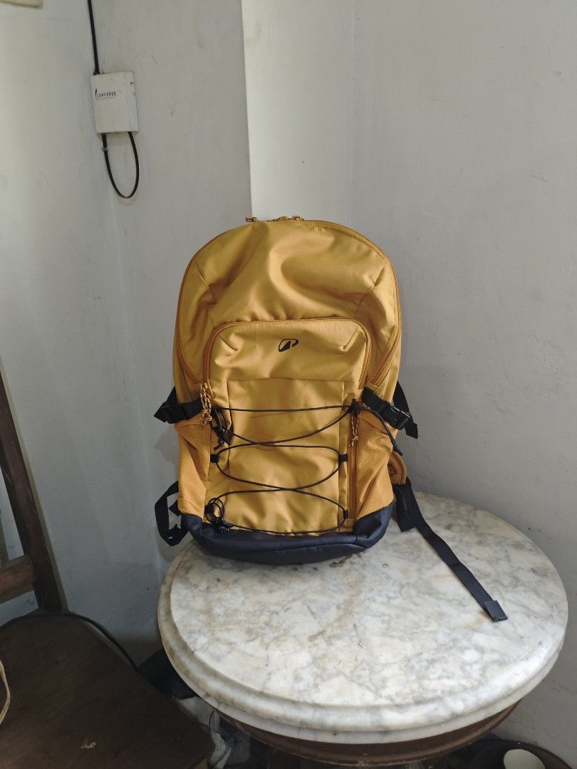 Quechua Arpenaz 500 20L Hiking Backpack Yellow (Category: Backpacks) located in Manila. Submitted by alvelagabriel (Listing ID 1446016357, Image 1). Description: - Quechua Arpenaz 500 hiking backpack -loc Antipolo Masinag - Color: Yellow - Capacity: 20L - Features: Multiple internal compartments for organization, front bungee cords for extra storage - Ideal for: Day trips, hiking - Condition: Good, with minor signs of wear .