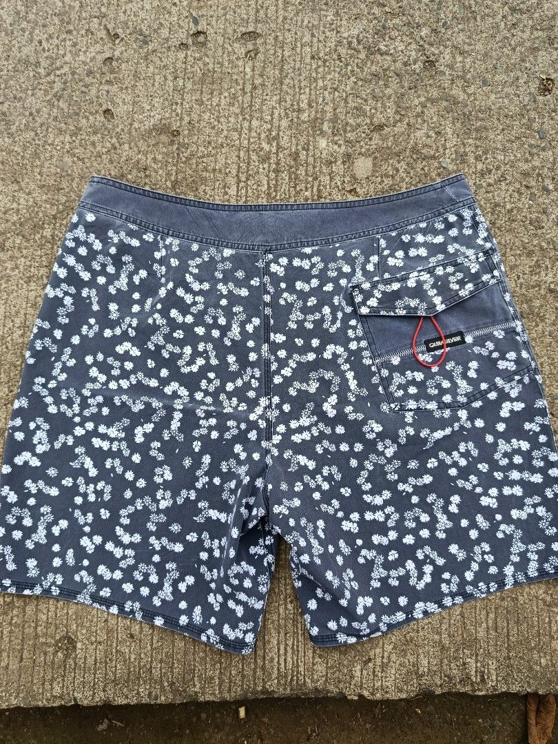Quiksilver Highline Boardshorts Floral Pattern (Category: Swim Trunks & Board Shorts) located in Jasaan. Submitted by eliwhomp (Listing ID 1446053911, Image 2). Description: - Quiksilver boardshorts - Cool grey and white floral print - Drawstring waist - Back pocket with red pull tab - Quiksilver logo on left leg - 'Highline' model - Ideal for beach or pool.
