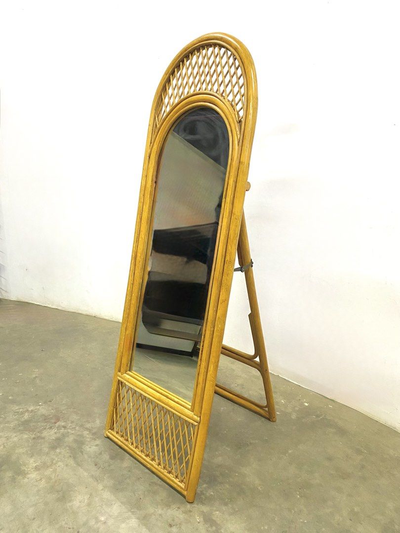 Rattan Arch Floor Mirror with Stand (Category: Mirrors) located in Santa Rosa. Submitted by annie_annie83 (Listing ID 1446146525, Image 2). Description: - Full-length rattan mirror - Arched top with intricate woven detail - Built-in stand for easy placement - Ideal for dressing or as a decorative accent - Creates a natural, bohemian atmosphere - Lightweight and portable.