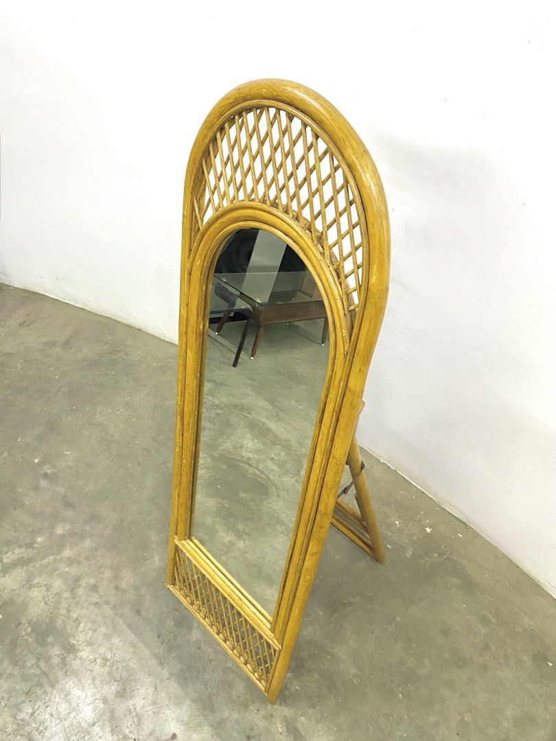 Rattan Arch Floor Mirror with Stand (Category: Mirrors) located in Santa Rosa. Submitted by annie_annie83 (Listing ID 1446146525, Image 3). Description: - Full-length rattan mirror - Arched top with intricate woven detail - Built-in stand for easy placement - Ideal for dressing or as a decorative accent - Creates a natural, bohemian atmosphere - Lightweight and portable.