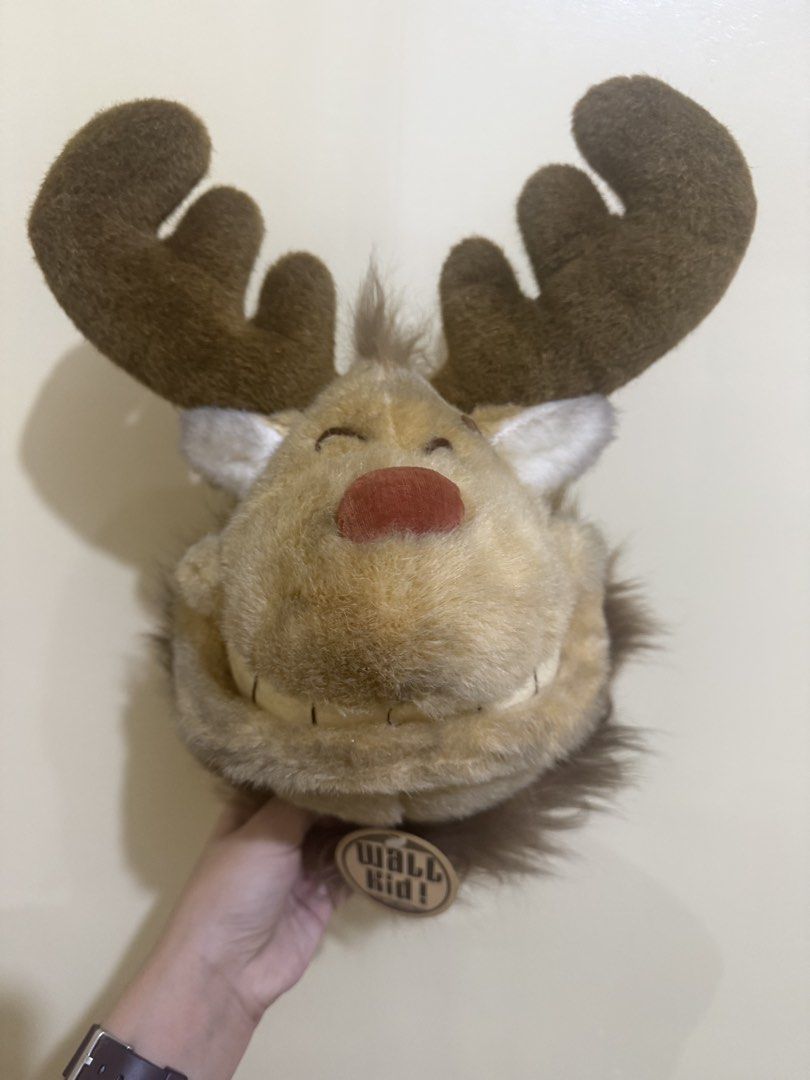 Reindeer Plush Toy Head Mount (Category: Plushies & Soft Toys) located in Liloan. Submitted by kiriana_fox (Listing ID 1446012997, Image 1). Description: - Cute reindeer plush toy from Walt Kid! - Features big antlers and a fluffy mane. - Has a bright red nose. - Ideal for Christmas decoration or as a fun gift..