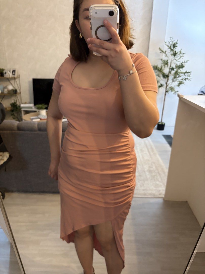 Ruched Midi Dress with Collar (Category: Dresses) located in Floridablanca. Submitted by ruthfsa (Listing ID 1446142526, Image 2). Description: Ruched Midi Dress with Collar - Best fit womens Large to Semi-XL - Brand new with ziplock pouch - Chic pink ruched midi dress - Features a stylish collar and short sleeves - Asymmetrical hemline with a flattering slit - Designed for a very flattering fit - Ideal for a night out or a special occasion - Sty