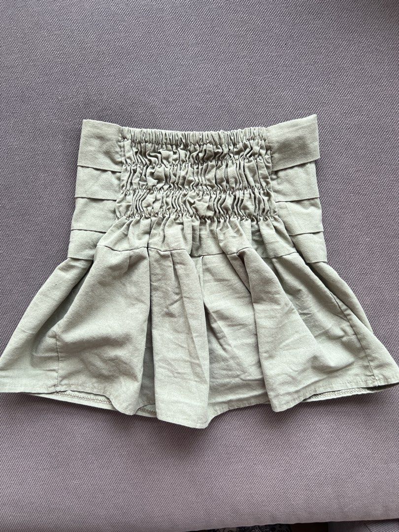 Sage Green Tube Top Loose (Category: Skirts) located in Quezon City. Submitted by cheskatan (Listing ID 1446065678, Image 2). Description: Height: 13.5 inches Width: 19 inches Bust: 12.5 inches (adjustable) .
