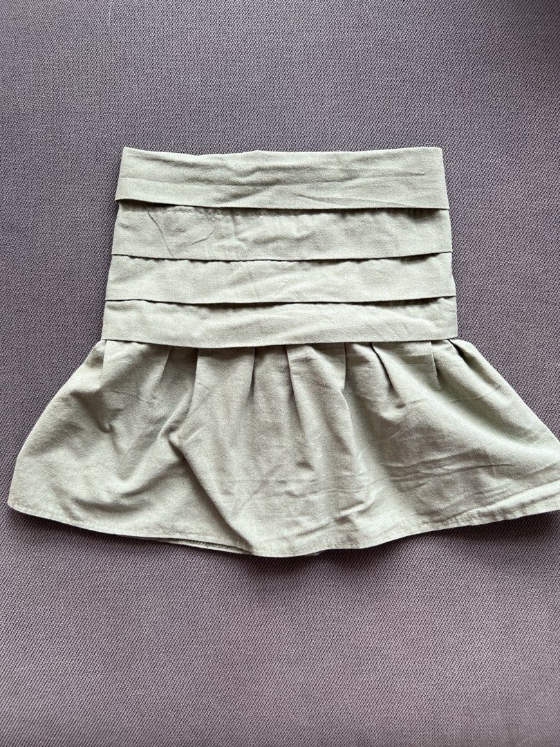 Sage Green Tube Top Loose (Category: Skirts) located in Quezon City. Submitted by cheskatan (Listing ID 1446065678, Image 1). Description: Height: 13.5 inches Width: 19 inches Bust: 12.5 inches (adjustable) .